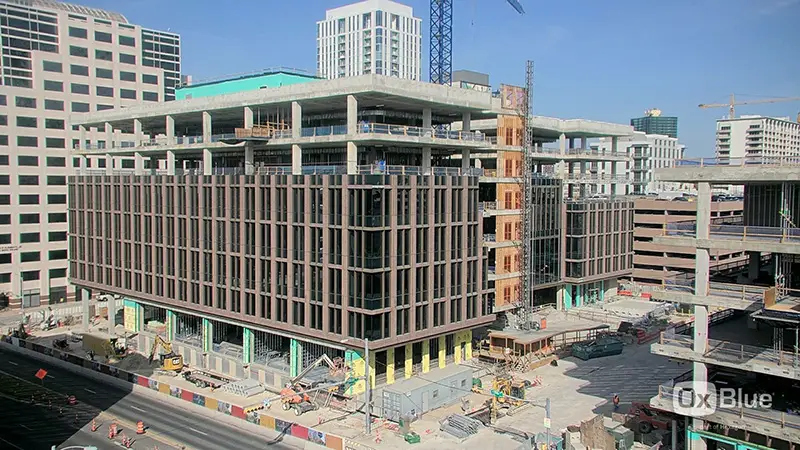 1501 Lavaca State Office Building-The project team is currently performing roofing, drywall, in wall and overhead MEP rough in, elevators, and the installation of the curtainwall system on Level 5.
