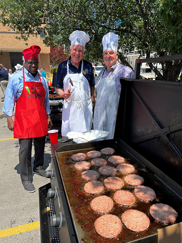 Novak (center) with Joel Speight, COO and Marty Martinez, Director of Facilities Maintenance and Operations at TFC employee appreciation cookout.