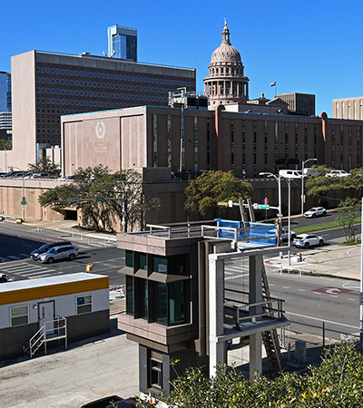 The two-story, visual mock-up at San Jacinto Boulevard and 15th Street with the State Capitol in the background.